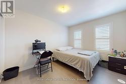 2nd bedroom with quiet street view - 