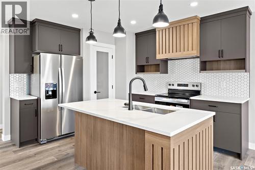 1725 Mustard Street, Regina, SK - Indoor Photo Showing Kitchen With Stainless Steel Kitchen With Upgraded Kitchen