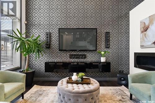 7832 Sagebrush Crescent, Regina, SK - Indoor Photo Showing Living Room With Fireplace