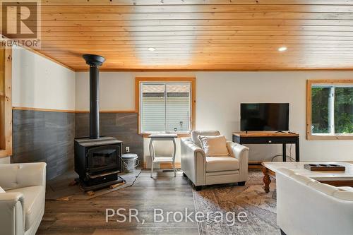 2676 Muskoka District 169 Road, Muskoka Lakes (Wood (Muskoka Lakes)), ON - Indoor Photo Showing Living Room With Fireplace