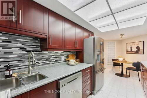309 - 70 Cumberland Lane, Ajax (South West), ON - Indoor Photo Showing Kitchen With Double Sink