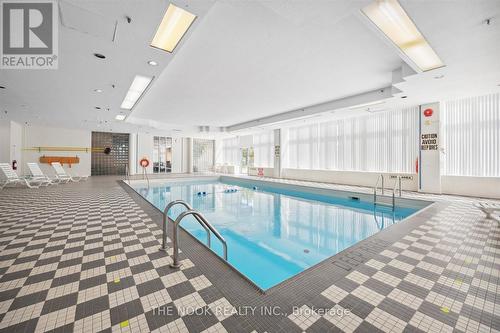 309 - 70 Cumberland Lane, Ajax (South West), ON - Indoor Photo Showing Other Room With In Ground Pool
