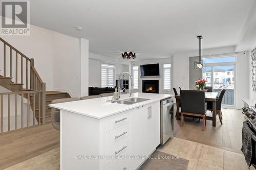 Kitchen - 28 Mendoza Way, Ottawa, ON - Indoor Photo Showing Other Room With Fireplace