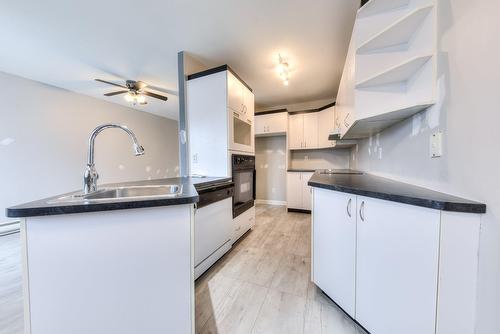 Cuisine - 1066 Rue De La Famille-Dubreuil, Montréal (Rivière-Des-Prairies/Pointe-Aux-Trembles), QC - Indoor Photo Showing Kitchen With Double Sink
