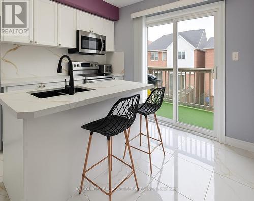 3 - 5050 Intrepid Drive, Mississauga, ON - Indoor Photo Showing Kitchen With Double Sink