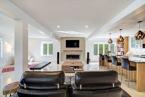 Living room - 11Z Rue Dupuis, Saint-Jacques, QC - Indoor With Fireplace