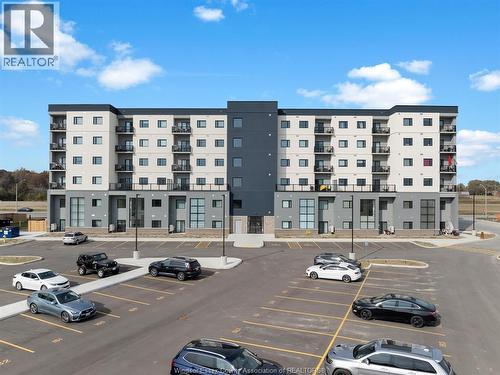 7337 Meo Boulevard Unit# 415, Lasalle, ON - Outdoor With Balcony With Facade