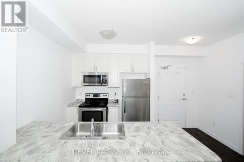 228 - 101 Shoreview Place, Hamilton (Lakeshore), ON - Indoor Photo Showing Kitchen With Double Sink