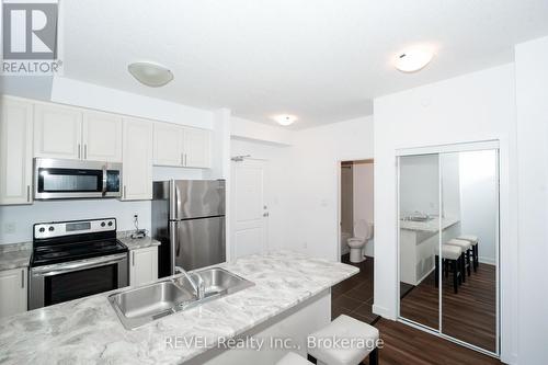 228 - 101 Shoreview Place, Hamilton (Lakeshore), ON - Indoor Photo Showing Kitchen With Double Sink With Upgraded Kitchen