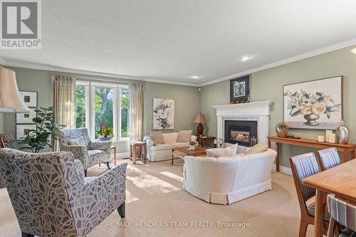 704 Vine Street, St. Catharines (Lakeshore), ON - Indoor Photo Showing Living Room With Fireplace