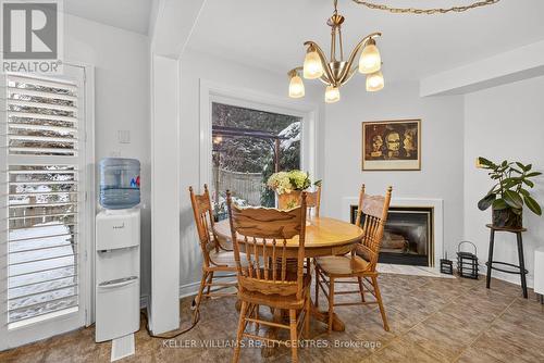 84 Loraview Lane, Aurora, ON - Indoor Photo Showing Dining Room With Fireplace