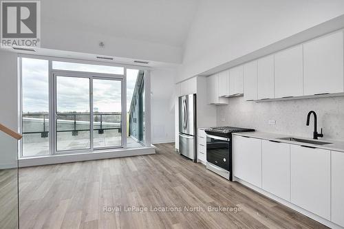Living Room/kitchen - 612 - 31 Huron Street, Collingwood, ON - Indoor Photo Showing Kitchen With Upgraded Kitchen