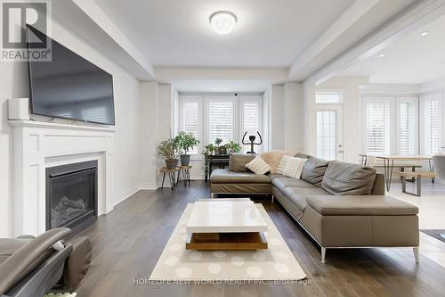50 Ben Sinclair Avenue, East Gwillimbury, ON - Indoor Photo Showing Living Room With Fireplace