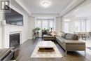 50 Ben Sinclair Avenue, East Gwillimbury, ON  - Indoor Photo Showing Living Room With Fireplace 