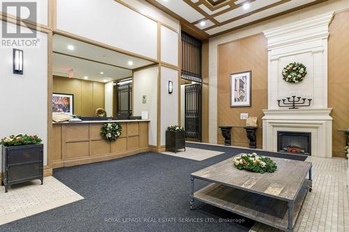 619 - 800 Lawrence Avenue W, Toronto, ON - Indoor Photo Showing Other Room With Fireplace
