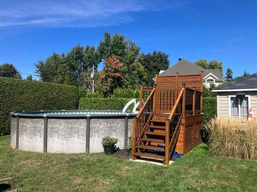 Backyard - 66 Rue Douglas-Anderson, Châteauguay, QC - Outdoor With Above Ground Pool
