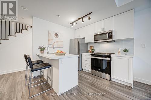 8 - 1479 O'Connor Drive, Toronto, ON - Indoor Photo Showing Kitchen With Stainless Steel Kitchen With Upgraded Kitchen