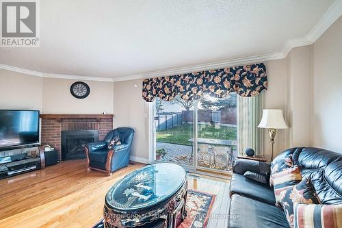 4284 Sawmill Valley Drive, Mississauga, ON - Indoor Photo Showing Living Room With Fireplace
