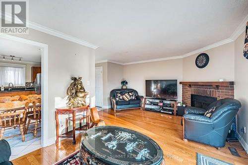 4284 Sawmill Valley Drive, Mississauga, ON - Indoor Photo Showing Living Room With Fireplace