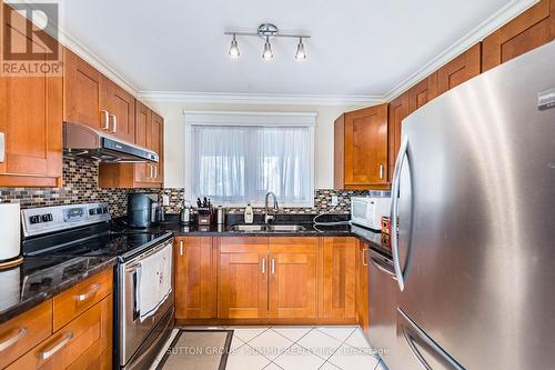 4284 Sawmill Valley Drive, Mississauga, ON - Indoor Photo Showing Kitchen With Double Sink
