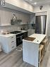 307 - 485 Logan Avenue, Toronto, ON  - Indoor Photo Showing Kitchen With Double Sink With Upgraded Kitchen 
