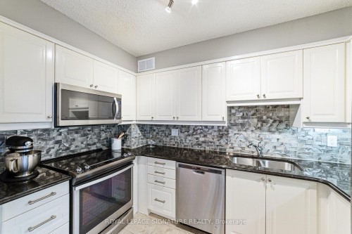 503-212 Kerr Street, Oakville, ON - Indoor Photo Showing Kitchen With Double Sink