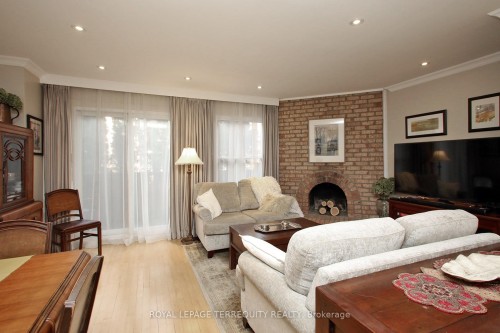 10-20 Cotton Downway N/A, Toronto, ON - Indoor Photo Showing Living Room With Fireplace