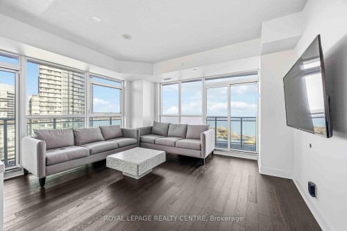 2109-33 Shore Breeze Drive W, Toronto, ON - Indoor Photo Showing Living Room