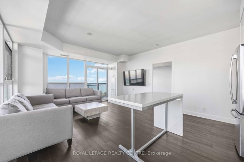 2109-33 Shore Breeze Drive W, Toronto, ON - Indoor Photo Showing Living Room