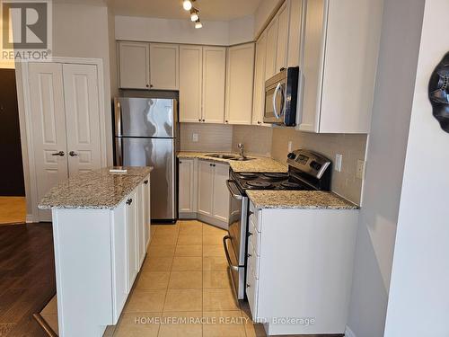 406 - 225 Webb Drive, Mississauga, ON - Indoor Photo Showing Kitchen With Double Sink