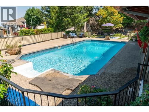 514 Hawes Court, Kelowna, BC - Outdoor With In Ground Pool With Deck Patio Veranda With Backyard
