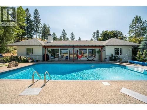 514 Hawes Court, Kelowna, BC - Outdoor With In Ground Pool With Backyard