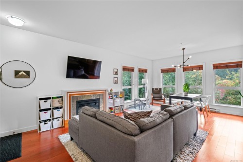 303-101 Nursery Hill Dr, View Royal, BC - Indoor Photo Showing Living Room With Fireplace
