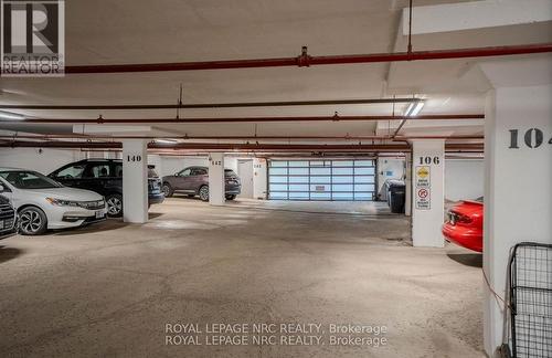 201 - 81 Scott Street, St. Catharines (Lakeport), ON - Indoor Photo Showing Garage