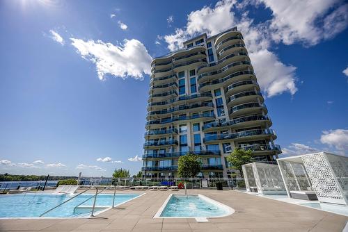 Piscine - Ph201-275 Rue Étienne-Lavoie, Laval (Sainte-Dorothée), QC - Outdoor With In Ground Pool With Facade