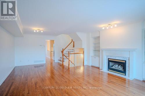 4 Schoolhouse Private, Ottawa, ON - Indoor Photo Showing Living Room With Fireplace
