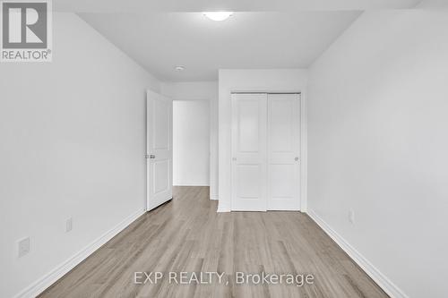 UNSTAGED 3rd BEDROOM - 103 - 5 Cityview Drive S, Guelph, ON - Indoor Photo Showing Other Room