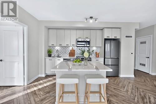 ***VIRTUALLY STAGED*** - 1707 - 4699 Glen Erin Drive, Mississauga, ON - Indoor Photo Showing Kitchen With Stainless Steel Kitchen
