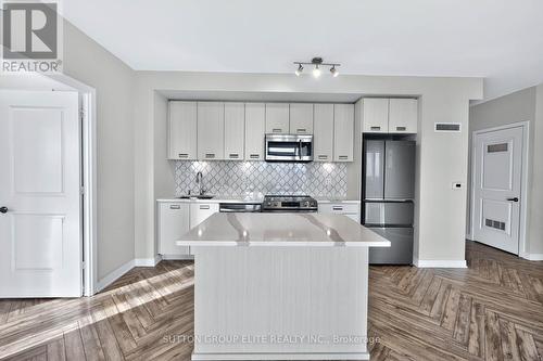 1707 - 4699 Glen Erin Drive, Mississauga, ON - Indoor Photo Showing Kitchen With Stainless Steel Kitchen With Upgraded Kitchen