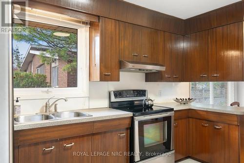 Double stainless sink under huge window. - 31 St Lawrence Drive, St. Catharines (Bunting/Linwell), ON - Indoor Photo Showing Kitchen With Double Sink