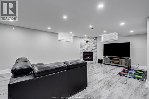 31 Heathview Trail, Leamington, ON - Indoor Photo Showing Basement With Fireplace