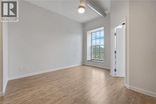Living room that looks out over Main Street (north facing) - 31 Main Street Unit# 301, Cambridge, ON - Indoor Photo Showing Other Room