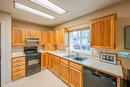9-10505 Quinpool Road, Summerland, BC  - Indoor Photo Showing Kitchen With Double Sink 