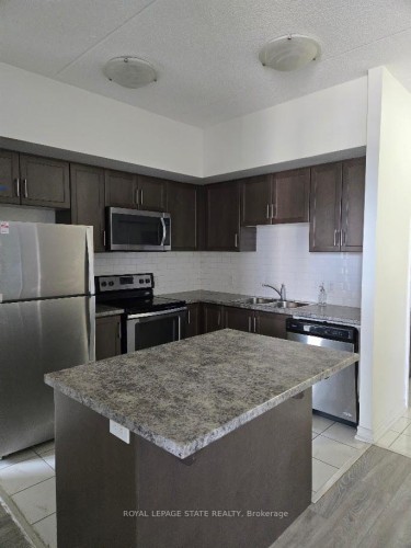 404-650 Sauve Street, Milton, ON - Indoor Photo Showing Kitchen With Double Sink With Upgraded Kitchen