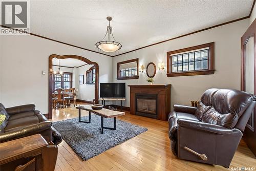 1334 Victoria Avenue, Regina, SK - Indoor Photo Showing Living Room With Fireplace