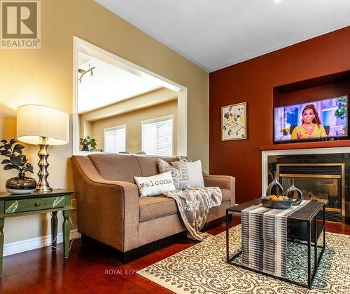 11 Oak Gardens Court, Brampton, ON - Indoor Photo Showing Living Room With Fireplace