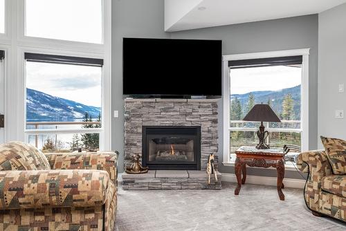202-3473 Lakeview Place, Enderby, BC - Indoor Photo Showing Living Room With Fireplace