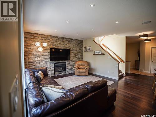 2715 Highgrove Road, Regina, SK - Indoor Photo Showing Living Room With Fireplace