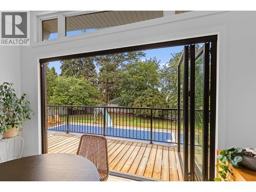 Ten foot bifold doors that fully open to create true indoor-outdoor living - 1511 Lambert Avenue, Kelowna, BC - 