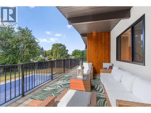 Partially covered deck that offers both sun and shade, perfect for year round outdoor enjoyment. - 1511 Lambert Avenue, Kelowna, BC - Outdoor With Exterior
